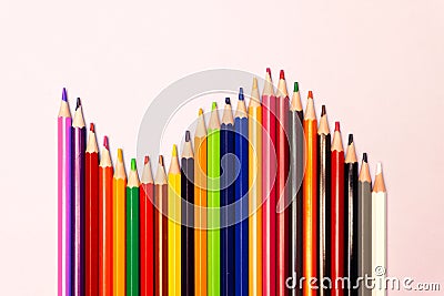 Ð¡olored pencils isolated on colored background. Close up Stock Photo